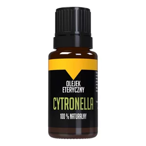 Szklana buteleczka z zieloną cytronellą w tle